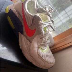 Nike Kids White Sneakers with Pink Swoosh and Neon Yellow Accents